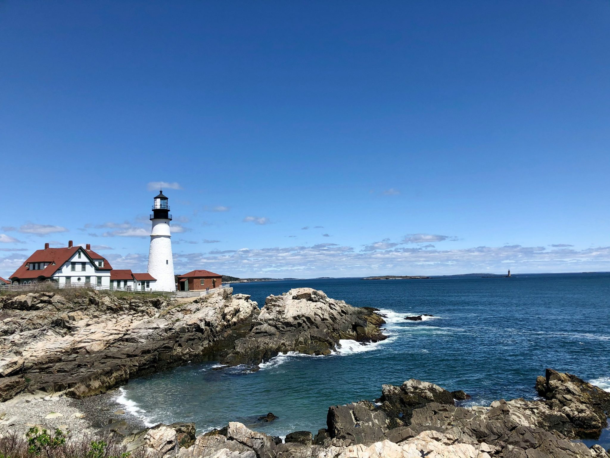 Lighthouse and rocky coast.